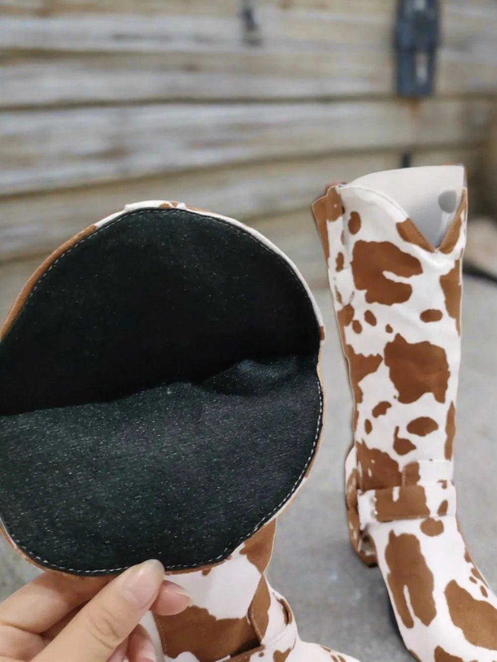 Inside of Cow Print Brown Boots