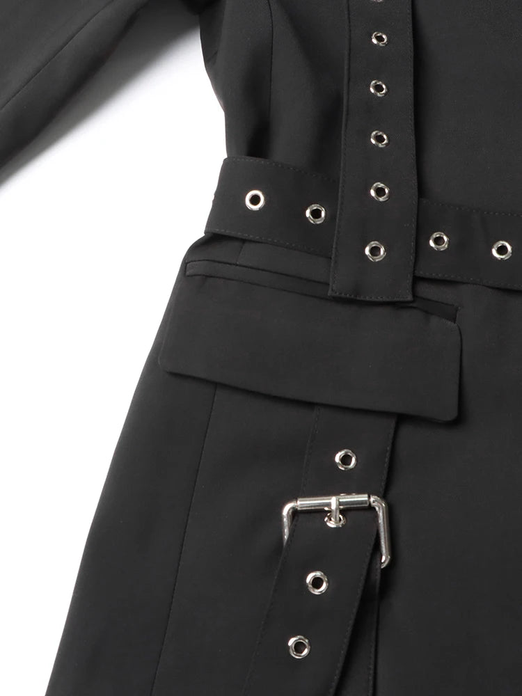 Belt and pockets on black blazer